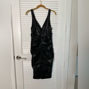 Nicole Miller collection. Size 4. Black dress